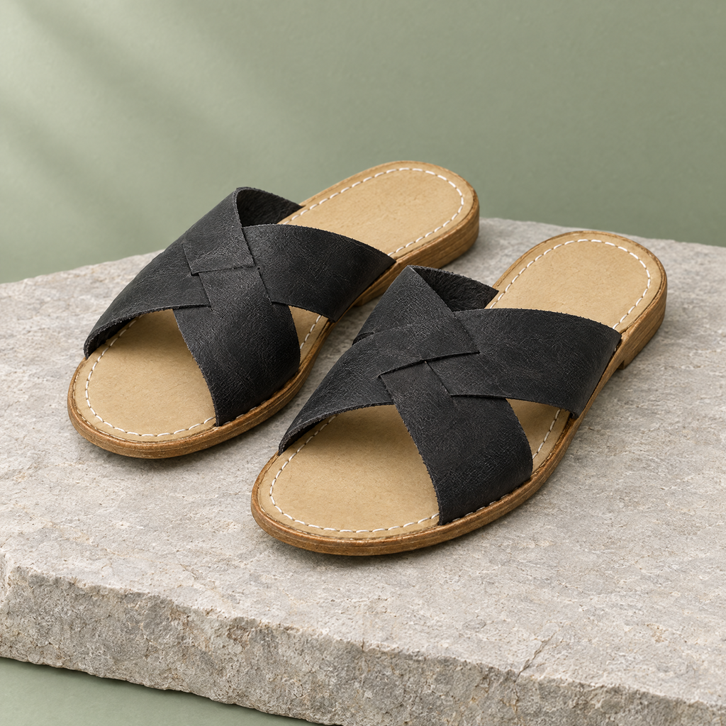 Delta grounding crossover sandal in Stone Black