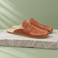 Flint grounding penny clog in Chestnut Brown, three-quarter view
