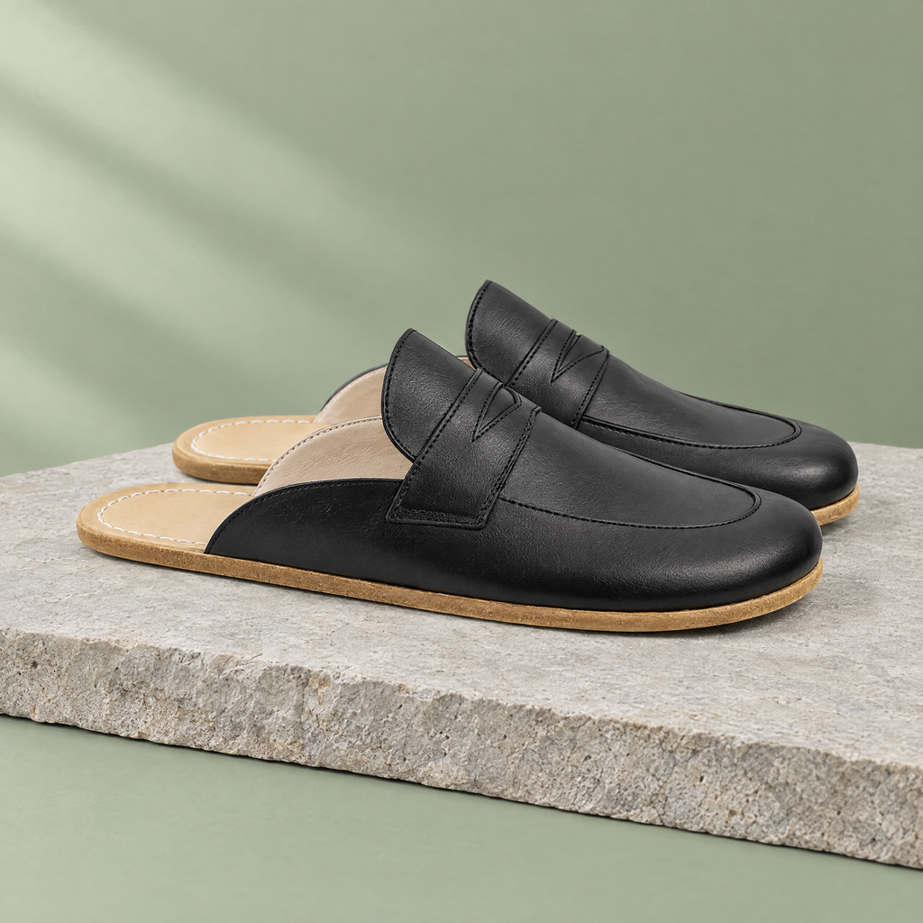 Flint grounding penny clog in Charcoal Black