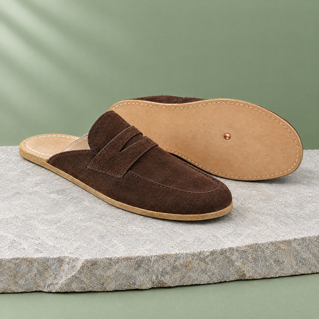 Leather outsole with copper grounding rivet under the ball of the foot