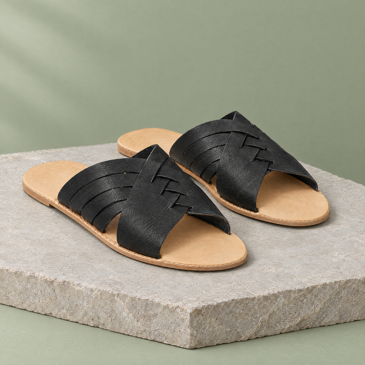 Juniper grounding criss-cross sandal in Charcoal Black