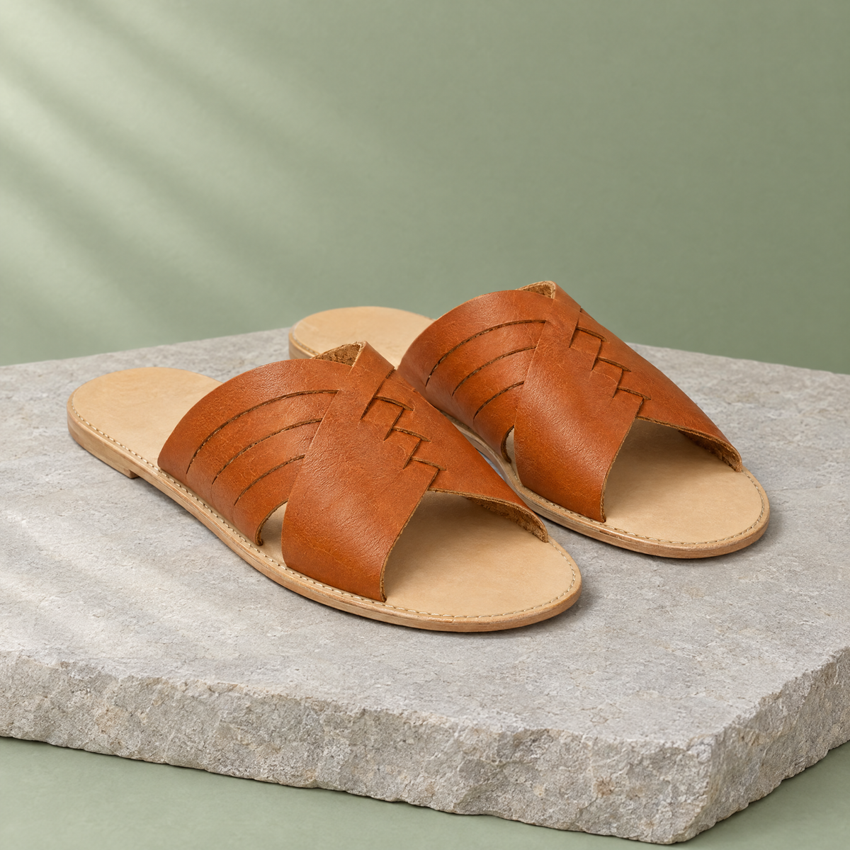 Juniper grounding criss-cross sandal in Hazelnut Brown, three-quarter view
