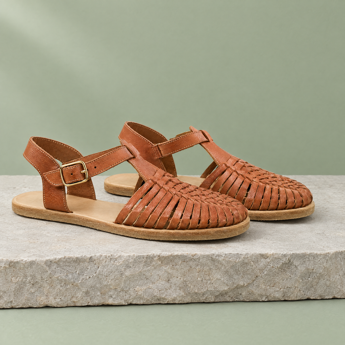 Saguaro grounding closed-toe huarache sandal in Hazelnut Brown, three-quarter view