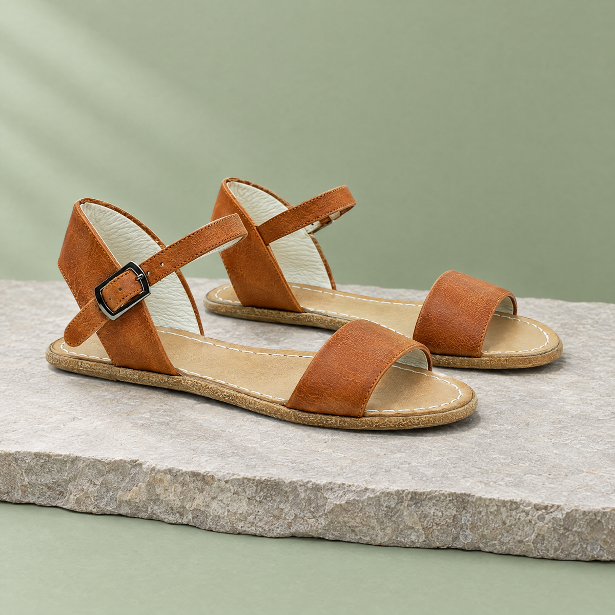 Tide grounding ankle-strap sandal in Honey Brown, three-quarter view