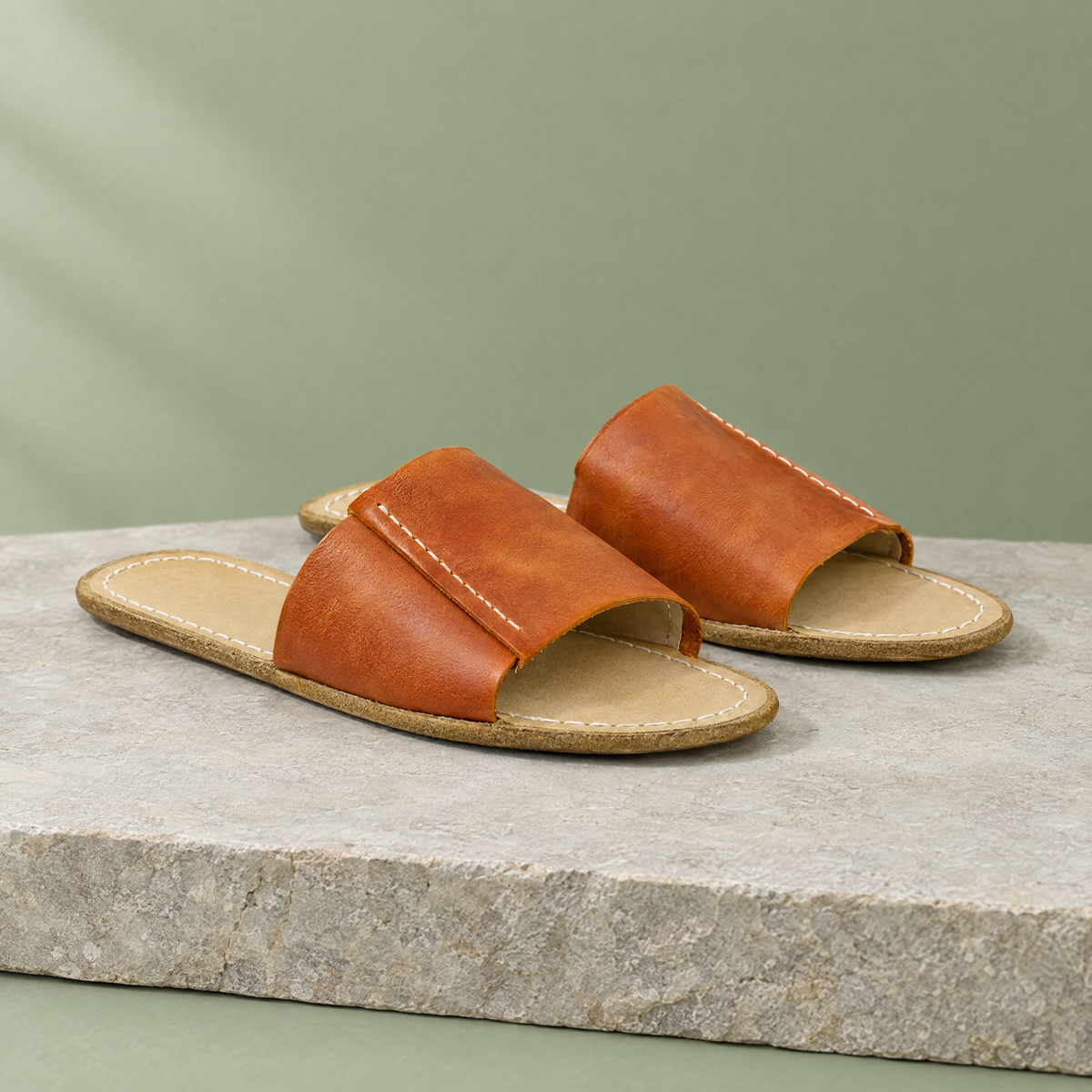 Shore grounding slide sandal in Honey Brown, three-quarter view