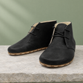 Basin grounding chukka boot in Charcoal Black, three-quarter view