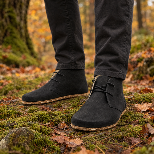 Basin grounding chukka boot worn outdoors on natural ground