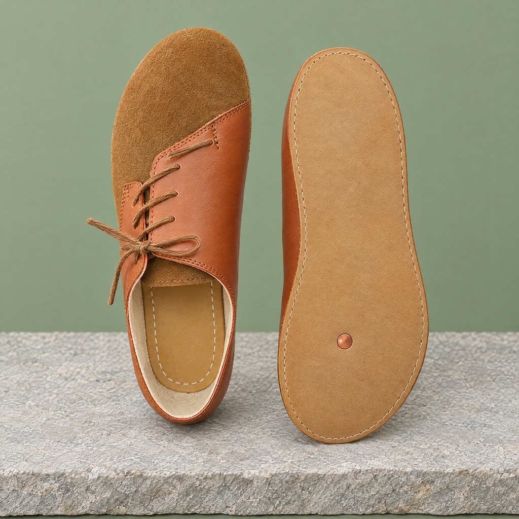 Leather outsole with copper grounding rivet under the ball of the foot