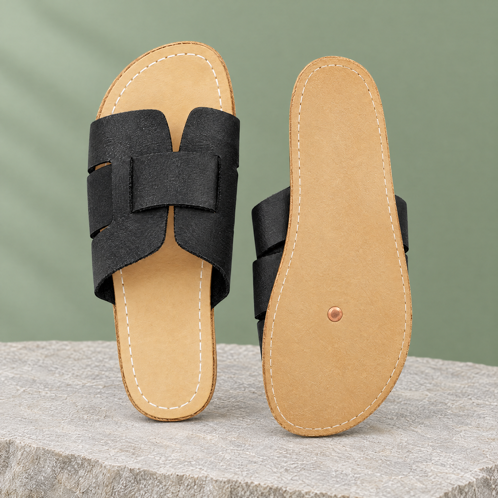 Leather outsole with copper grounding rivet under the ball of the foot