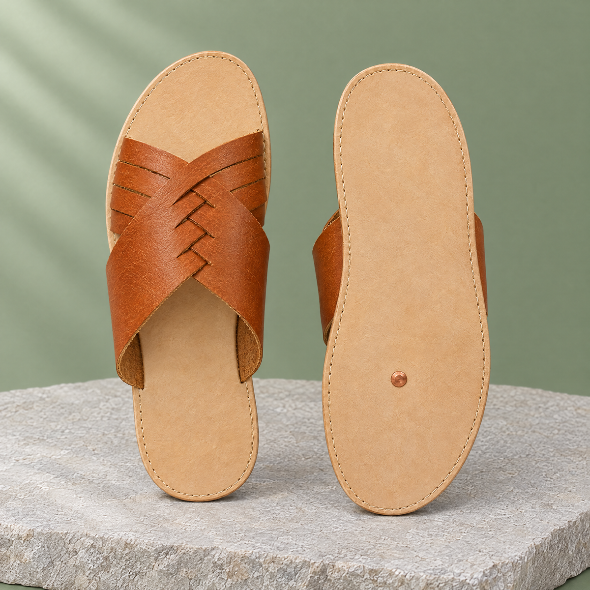 Leather outsole with copper grounding rivet under the ball of the foot