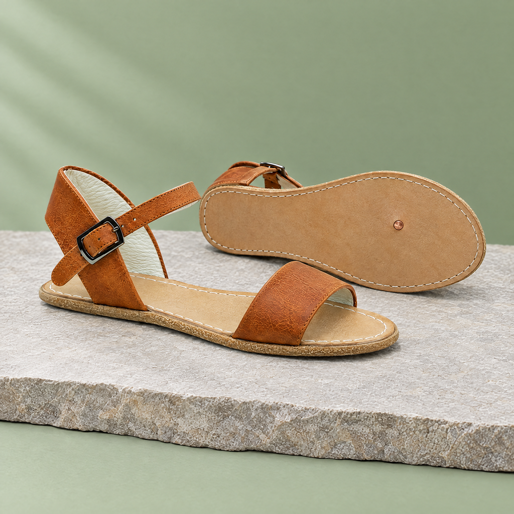 Leather outsole with copper grounding rivet under the ball of the foot