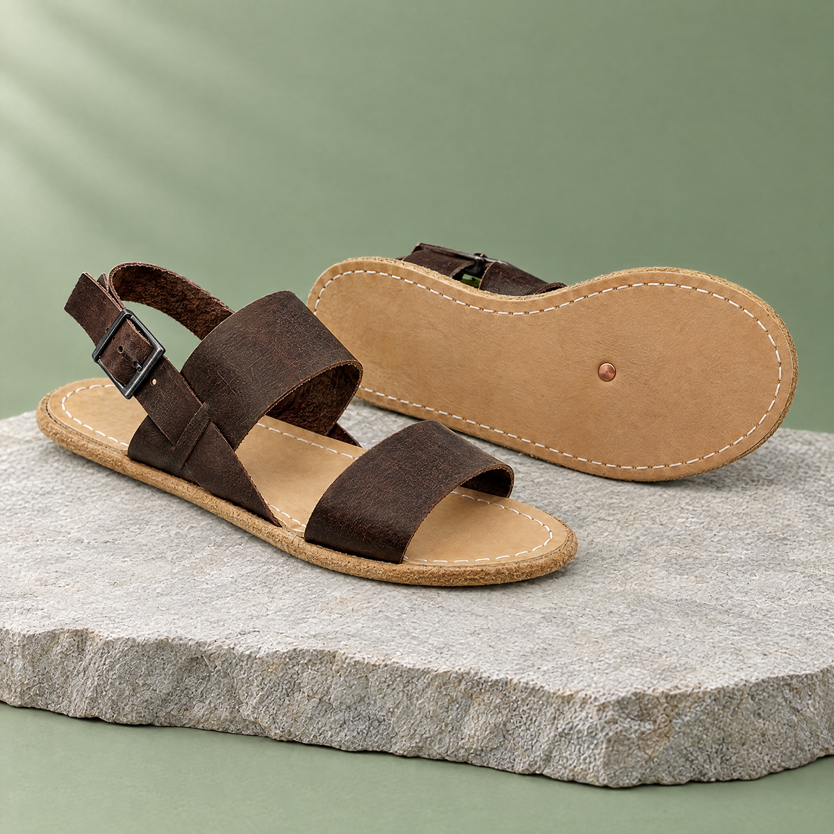 Leather outsole with copper grounding rivet under the ball of the foot