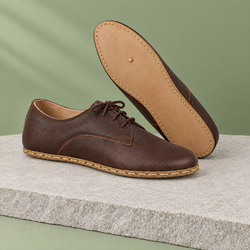 Leather outsole with copper grounding rivet under the ball of the foot